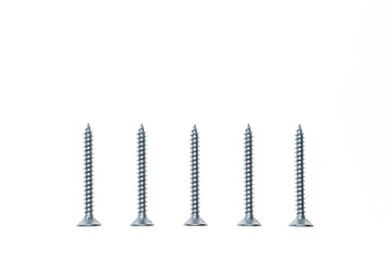 row of silver metal screws isolated on white background