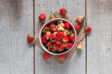 Ripe trawberries on the old wooden.