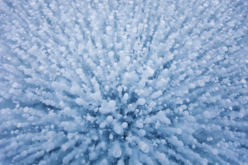 Gas bubbles. of Baikal lake. Winter texture