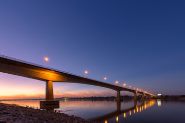 Bridge across the Mekong River at sunset. Thai-Lao friendship bridge at Nong Khai, Thailand