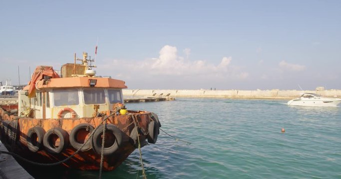 EL AVIV, ISR - MAR 20 2017. Fishing boats at the old port of Jaffa in Tel Aviv Jaffa, Israel.Its ancient port city in Israel famous for its beauty and ancient history. Rusty Boats.


