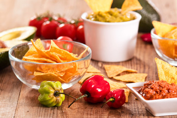 Guacamole and nacho chips. 