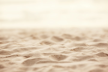Sand beach tropical with blurred sea sky and sunny background, summer day, copy space or for product.