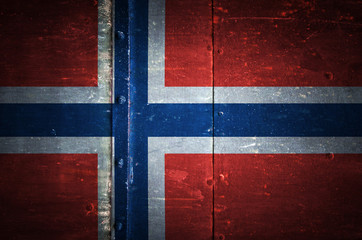 Norway flag on grunge metal texture background