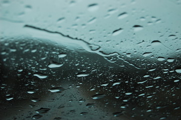 Rain droplets on car windshield