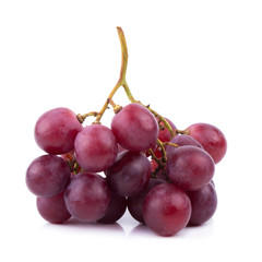 Bunches of fresh ripe red grapes on a white background