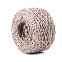 Roll of twine jute on sacking, hemp rope in paper roll isolated on white background.