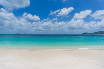 Fototapeta na wymiar Tropical island beach with white sand. Summer vacation background