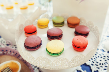 Macaroons Biscuits On White Stand.