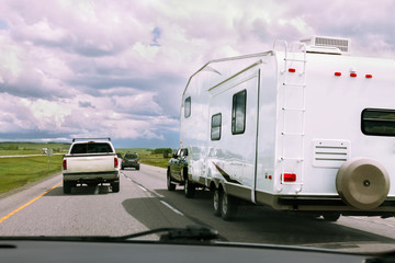 RV and cars on road