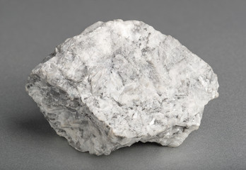 Mineral  magnesite. Magnesite are burnt to make magnesium oxide and used in jewelry-making,  in flooring material and as catalyst.