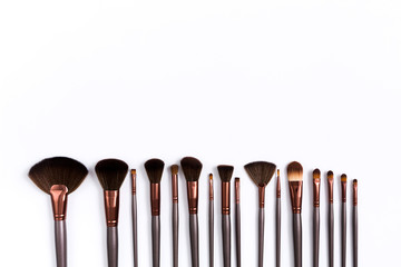 Cosmetics, beauty, make-up brushes set in row