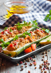 Zucchini stuffed with meat and vegetables
