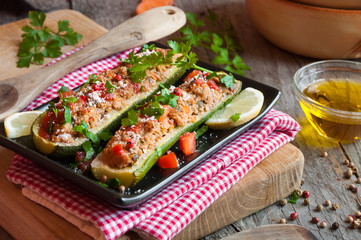 Zucchini stuffed with meat and vegetables
