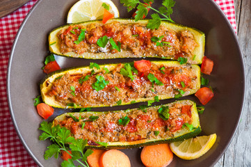 Zucchini stuffed with meat and vegetables