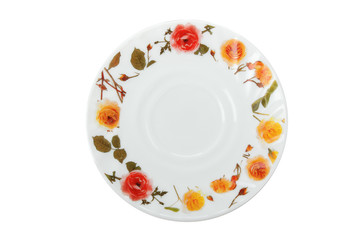  white plate with a picture of flowers