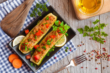 Zucchini stuffed with meat and vegetables