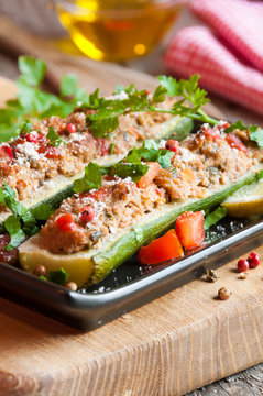 Zucchini stuffed with meat and vegetables