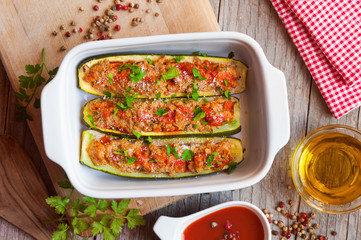 Zucchini stuffed with meat and vegetables