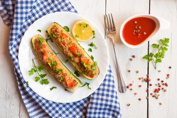 Zucchini stuffed with meat and vegetables