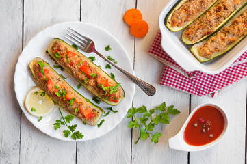 Zucchini stuffed with meat and vegetables
