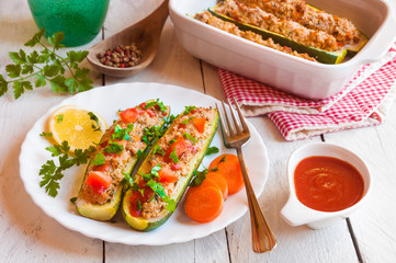 Zucchini stuffed with meat and vegetables