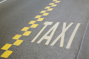 Yellow Taxi Sign in Brussels