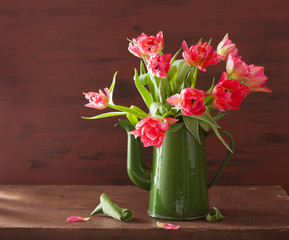 beautiful pink tulip flowers bouquet in green pot