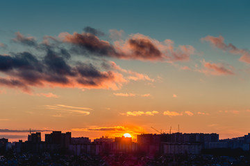 Voronezh City in sunset time, Silhouettes of houses in the evening haze 