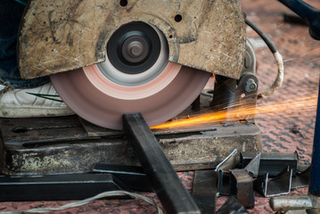 Fototapeta na wymiar saw machine cutting steel at site construction