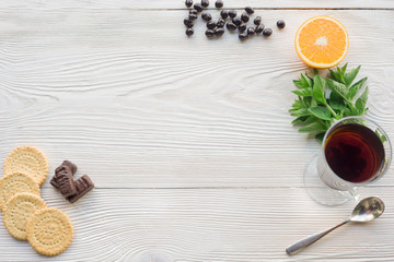 Fototapeta na wymiar Top view of fruit tea on wooden plank table