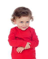 Adorable baby with curly hair playing to hugging