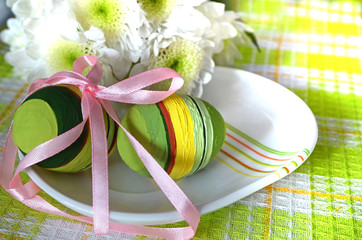 Easter composition. Dyed eggs with a branch of chrysanthemum. A good mood. Easter Festival