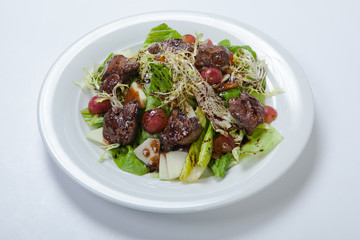 warm salad with chicken liver and grapes