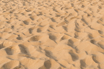 Fototapeta premium texture of sand pattern on a beach in the summer at Phuket, Thailand