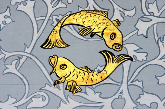 Pisces the fish zodiac sign.Ancient wall painting of a zodiac symbol of Pisces.