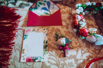 wedding invitation card with bride accesories flowers and text place in red colors. Copy space