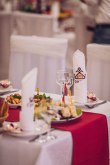 Beautiful table set for some festive event, party or wedding reception