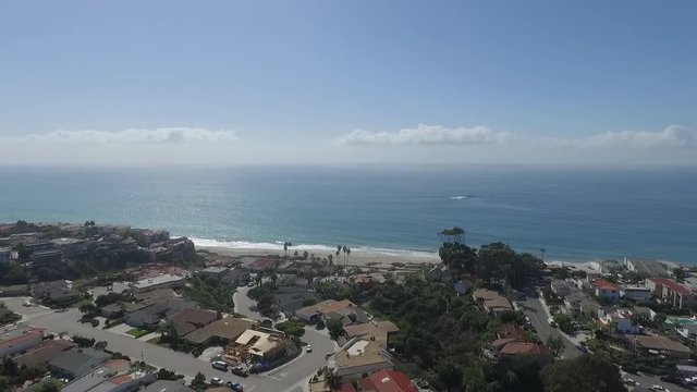 Panoramic view from drone of Pacific Ocean and San Juan Capistrano beach. Fly over beach city with spectacular view of Pacific Ocean