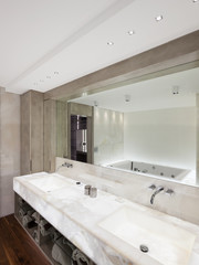 Fototapeta na wymiar Modern bathroom with marble and parquet, nobody
