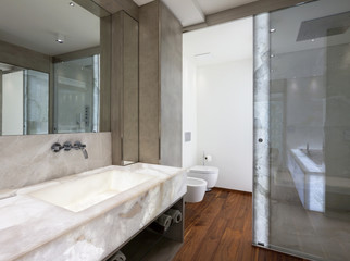 Fototapeta na wymiar Modern bathroom with marble and parquet, nobody