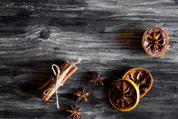Dried lemon slices and cinnamon on a wooden table. Natural product.