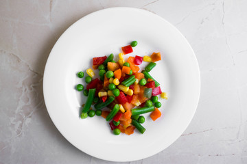 Mixed vegetables on a wooden table in rustic style