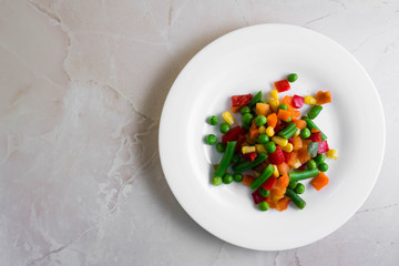 Mixed vegetables on a wooden table in rustic style
