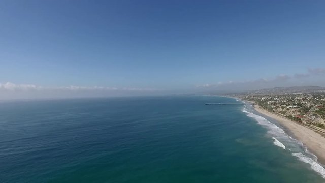 Panoramic view from drone of Pacific Ocean and San Juan Capistrano beach. Fly over beach city with spectacular view of Pacific Ocean