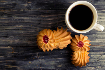 Fototapeta premium Cookies kurabe, on a wooden table in a rustic style.