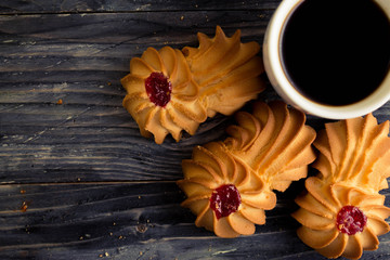 Cookies kurabe, on a wooden table in a rustic style.