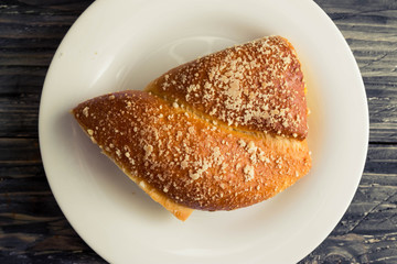 Austrian strudel with lemon and orange jam on a wooden table in rustic style
