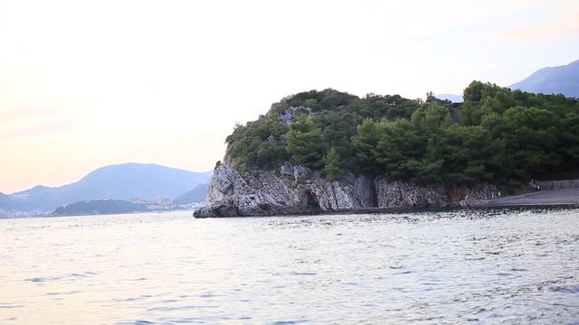Rock near the beach of the Queen, near the island of Sveti Stefan and Villa Milocer, Montenegro.