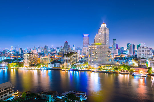 Bangkok skyline with Chao Phraya river view.